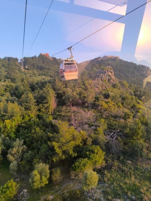 Alanya: Half Day Cable Car, Cave, Terraces&Sunset at Castle - The walk-down and the Teras viewpoint: sunset-style city photos