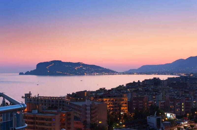 Alanya Optional Alcoholic Sunset Boat Cruise and Foam Party - Views from the sea: Red Tower, Alanya Castle, and the caves