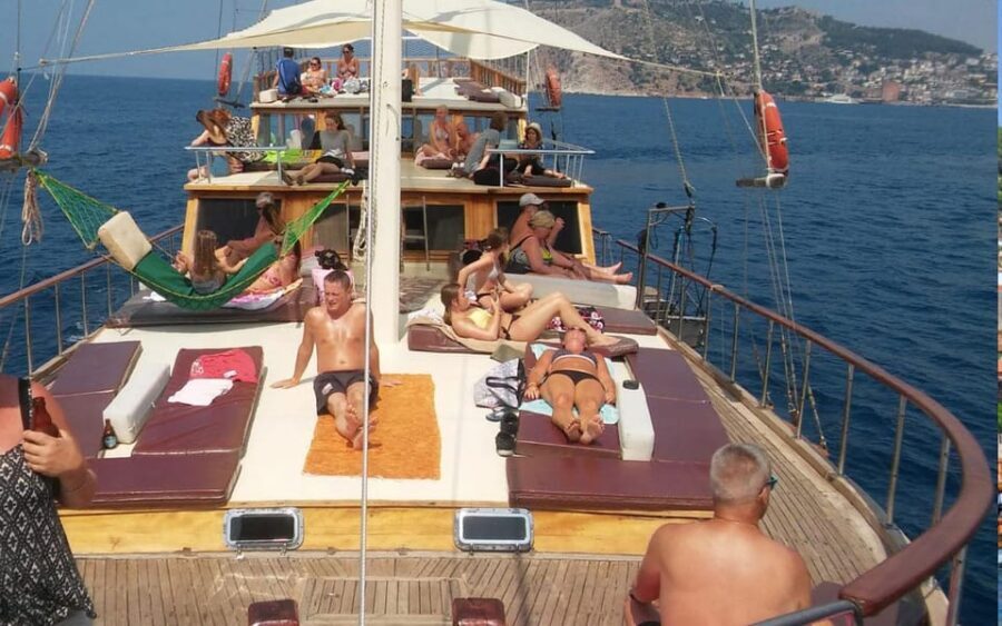 Alanya Relaxing Family Boat Tour Without Foam And Loud Music - Alanya sights from the water: Red Tower, castle views, and Pirate Caves