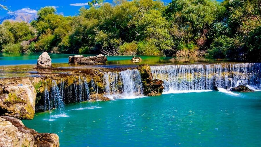 Alanya/Side: Manavgat River & Waterfall, Boat Tour, & Bazaar - Hotel pickup and the Side-area convertible bus surprise