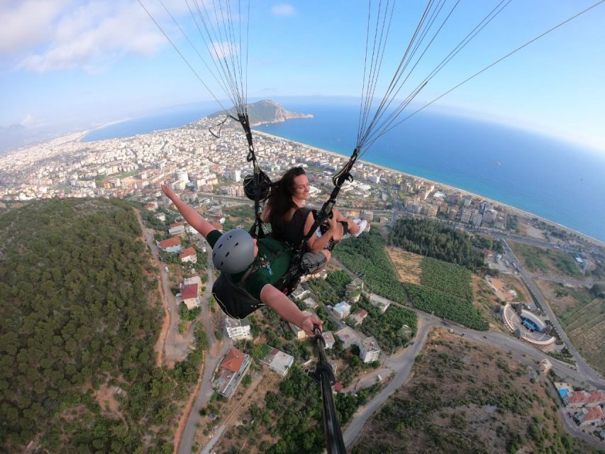 Alanya: Tandem Paragliding from 700m with Meeting or Pick Up - Getting to the takeoff point: pickup, bus ride, and the clock