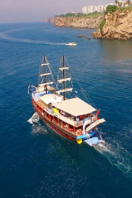 Antalya: Beach & Waterfalls Boat Trip w/ Lunch & Soft Drinks - On-board vibe: music, pirate energy, and named crew help