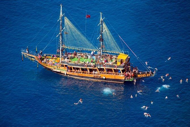 Dolphin Island Boat Trip – Swim, Sun & Lunch Included - Party boat reality: music, foam, animations, and the sound level question