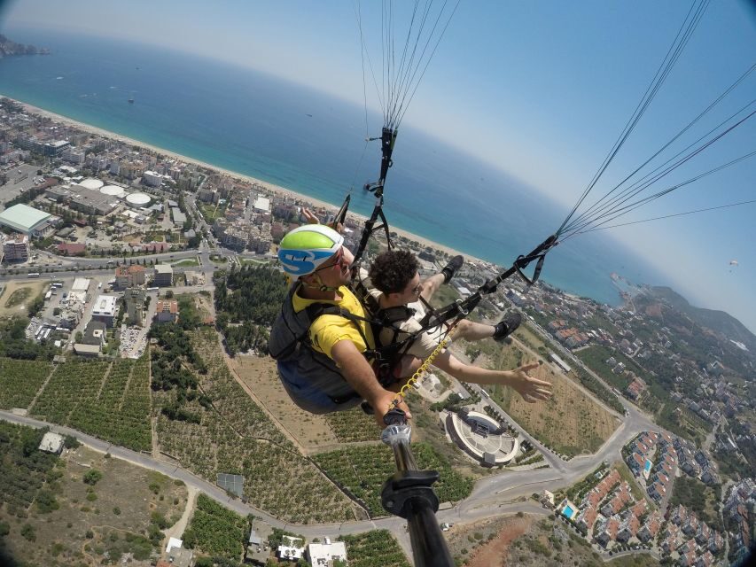From Alanya: Tandem Paragliding With Transfer and Insurance - Booking logistics that matter: meeting point and language support