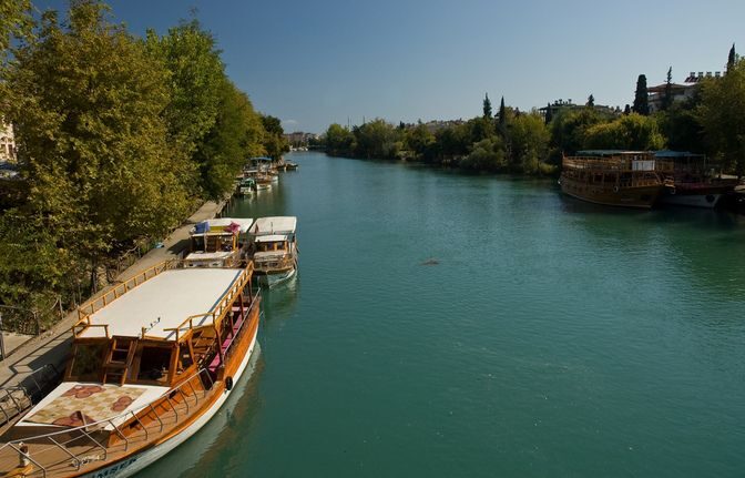 Manavgat Cruise & Grand Bazaar w/Lunch and Unlimited Drinks - Manavgat River Cruise: Taurus Mountains Views and a Real Swim Stop