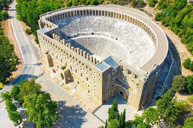 Perge, Aspendos, Side and Waterfall Full Day Tour - Aspendos Ruins: The Theater Scene and the Zenon Story