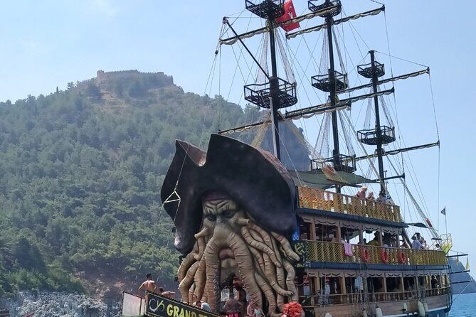 Pirate Boat Tour With Foam Party in Alanya - Stop 1 at Kleopatra Plajı: the cave swim and first big splash window