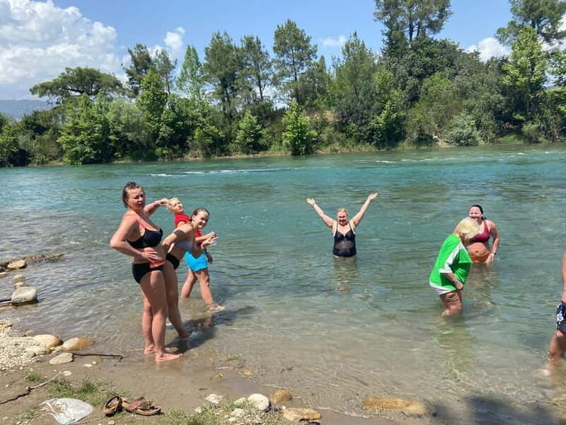Side/Antalya: Canyon Rafting, Buggy or Quad, & Zipline Tour - Getting ready for rafting: helmets, life jackets, and that old-bridge photo stop
